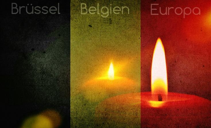 The colours of the Belgian flag over an image of candles